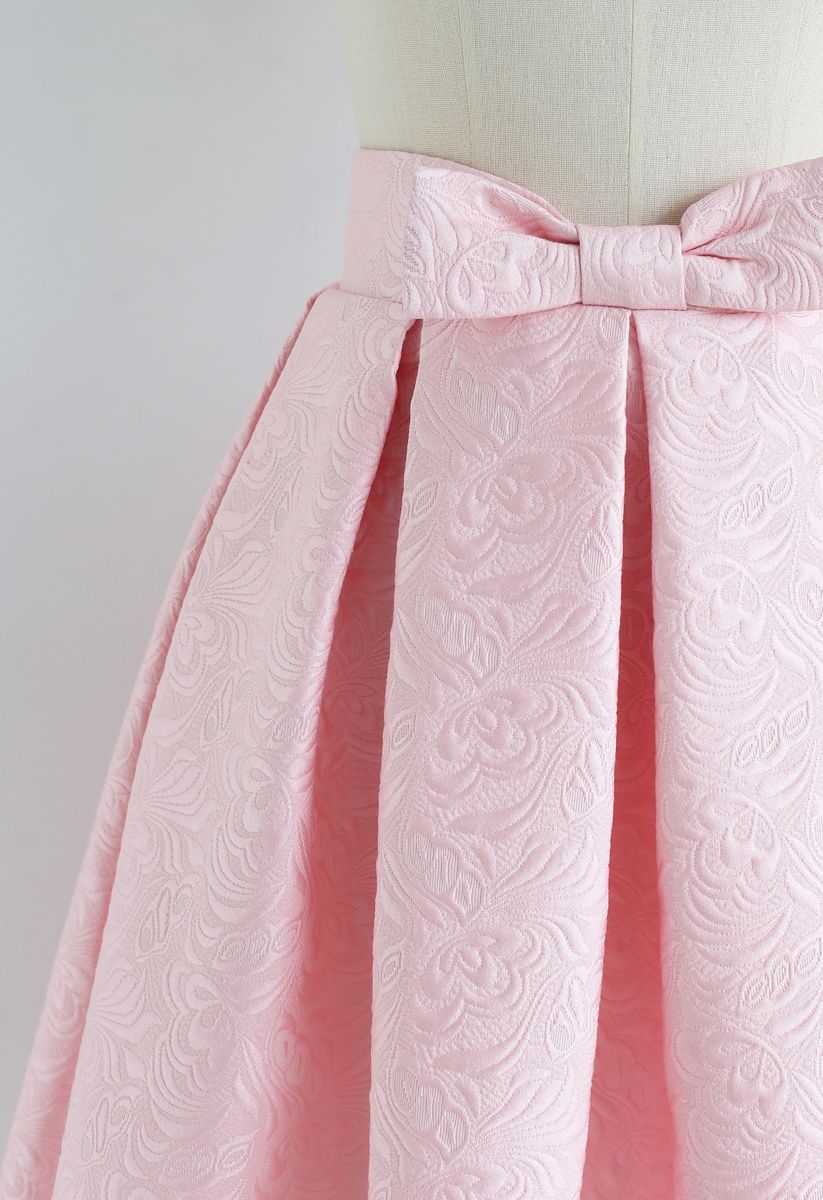Falda midi de jacquard plisada con lazo en rosa