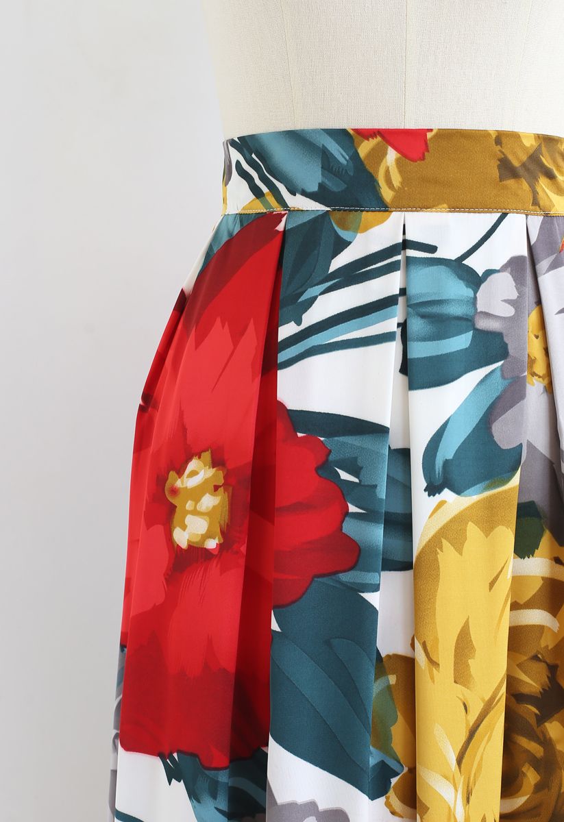 Falda midi plisada con estampado floral brillante