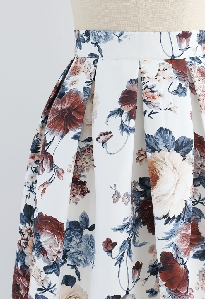 Falda midi plisada con estampado floral barroco