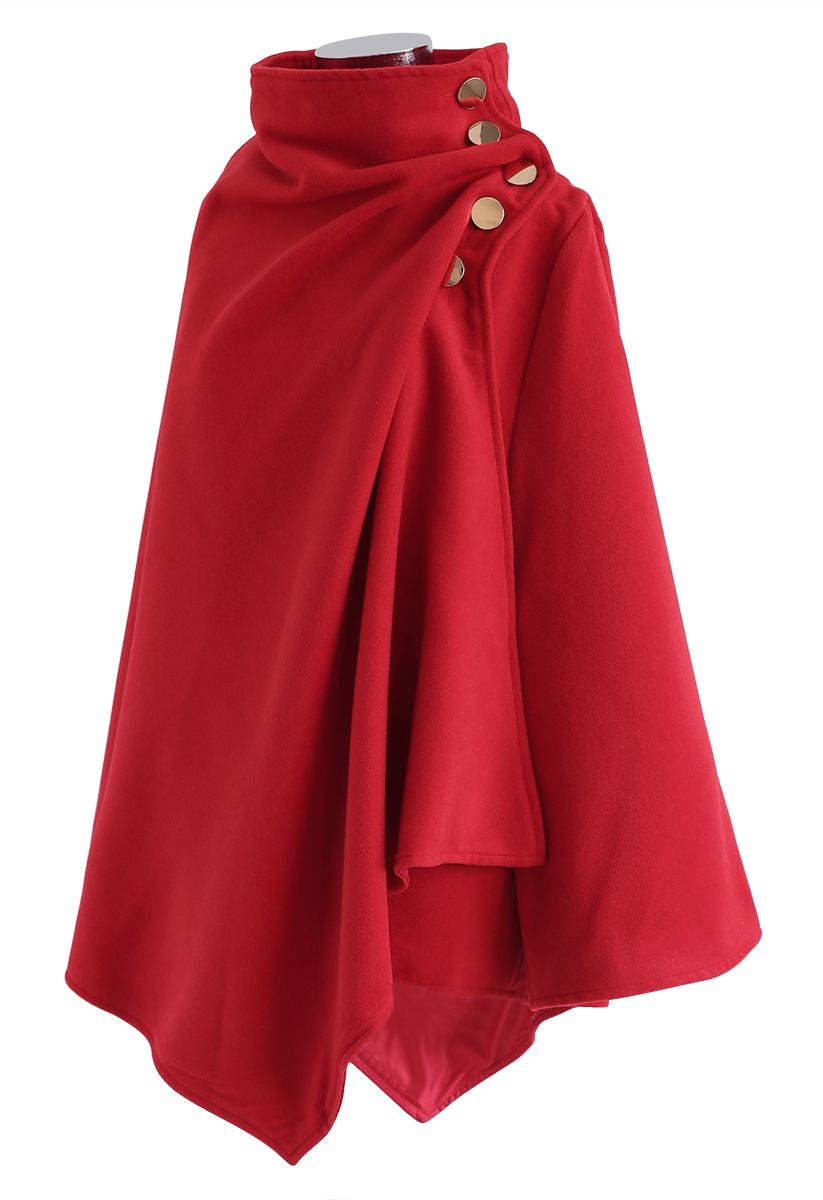 Abrigo tipo capa cruzado con botones y dobladillo asimétrico en rojo