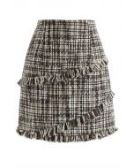 Minifalda de brote de tweed con borlas
